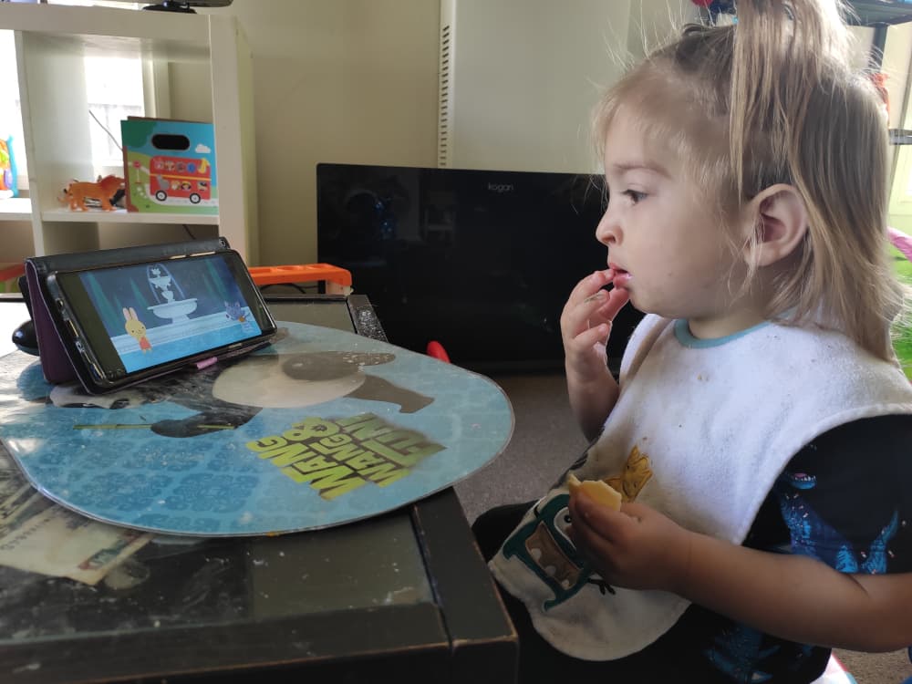 Child watching YouTube video on PlayOn Cloud